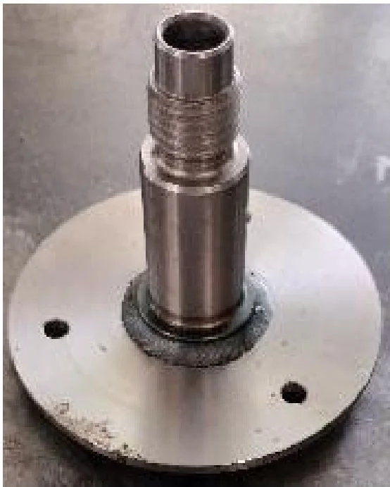 Precision machined shaft with flange